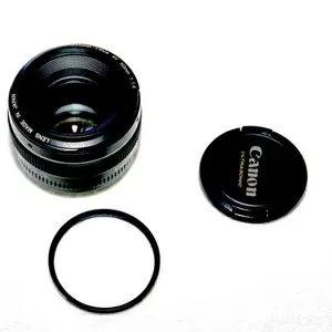 объектив Canon 50mm f/1, 4 со светофильром и крышками